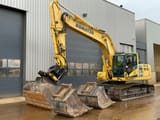 2014 Komatsu PC240LC-10 crawler excavator, side view with attachments