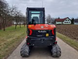 2023 Kubota KX060-5 mini excavator, rear view