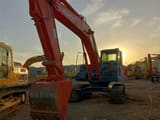 2023 Hitachi ZX210 crawler excavator, front three-quarter view