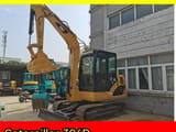 2013 Caterpillar 306D crawler excavator, side profile view