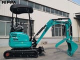 2026 Kubota R322L mini excavator side view