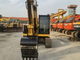 2022 Caterpillar 307.5E2 mini excavator, front view