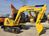 Komatsu PC70-8 mini excavator, side profile view