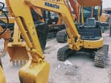 Komatsu PC30MR mini excavator, front three-quarter view