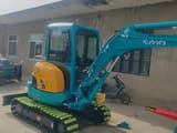 2023 Kubota U25 mini excavator, side view
