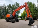 2012 Hitachi Zaxis 140W wheel excavator, side profile view