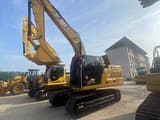 Excavadora de orugas Caterpillar 320CL 2024, vista de perfil lateral