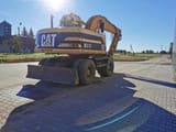 1996 Caterpillar M315 wheel excavator rear view