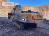 2017 Liebherr R976 crawler excavator, rear three-quarter view