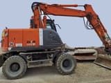 2011 Hitachi Zaxis 145W wheel excavator side view
