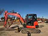 2019 Kubota KX057-4 mini excavator, side view