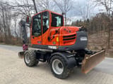 2018 Yanmar TW 95 wheel excavator, rear three-quarter view