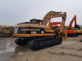 2012 Caterpillar 320BL crawler excavator, rear three-quarter view