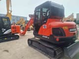 2022 Doosan DX55-9C crawler excavator, rear three-quarter view