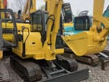 2022 Komatsu 56-7 crawler excavator, front three-quarter view