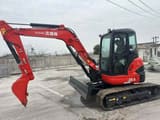 2022 Kubota U55-4 mini excavator side view