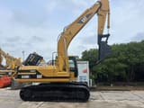 Caterpillar 320BL crawler excavator side view