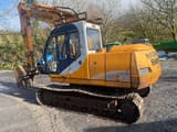 1995 Samsung LC130-2 crawler excavator, rear three-quarter view