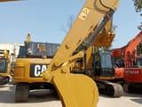 2023 Caterpillar 320GC crawler excavator, close-up of boom and bucket