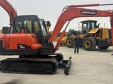 2018 Doosan DX60 crawler excavator, side view