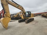 2023 Caterpillar 330 crawler excavator, side view