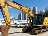 2023 Caterpillar 320GC crawler excavator, side profile view