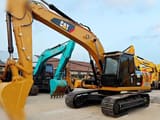 2018 Caterpillar 320D2 crawler excavator, front three-quarter view
