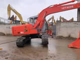 2015 Hitachi EX120-5 crawler excavator, rear three-quarter view