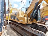 2022 Caterpillar 315DL crawler excavator side view