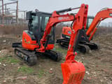 2024 Kubota U35 mini excavator, front three-quarter view