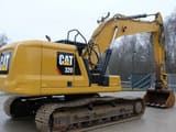 2019 Caterpillar 320 crawler excavator, rear three-quarter view