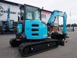 2025 Airman AX55U-7 mini excavator, rear three-quarter view