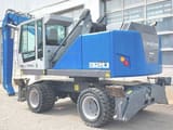 2016 Fuchs MHL320F material handler, rear three-quarter view