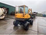 1990 Komatsu PW30-1 wheel excavator rear view