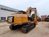 Pelle sur chenilles Caterpillar 320D de 2021, vue arrière trois-quarts
