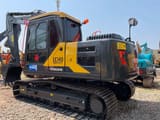 2023 Volvo EC140 crawler excavator, rear three-quarter view