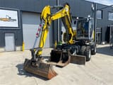 2022 Wacker Neuson EW100 wheel excavator, front three-quarter view