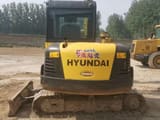 2023 Hyundai 60-7 mini excavator, rear view