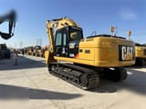 2020 Caterpillar 320D crawler excavator, rear three-quarter view
