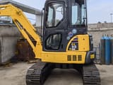 2023 Komatsu PC-55MR mini excavator, side profile view