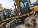 2024 Caterpillar 325D crawler excavator, front three-quarter view