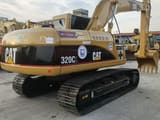 2019 Caterpillar 320CL excavator, rear three-quarter view
