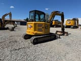 2023 Caterpillar 305 crawler excavator, rear three-quarter view