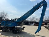 2011 Fuchs MHL340 wheel excavator side view