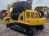 2023 Komatsu PC70-8 mini excavator, rear three-quarter view