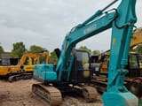 Kobelco SK140-8 crawler excavator, side view