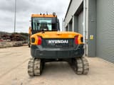 2023 Hyundai HX85A mini excavator, rear view