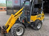 2014 Mustang AL 306 mini excavator, front three-quarter view
