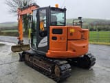 2022 Hitachi ZX85USB-6 mini excavator, rear three-quarter view