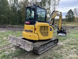 2021 Komatsu PC55MR-5 mini excavator, rear three-quarter view